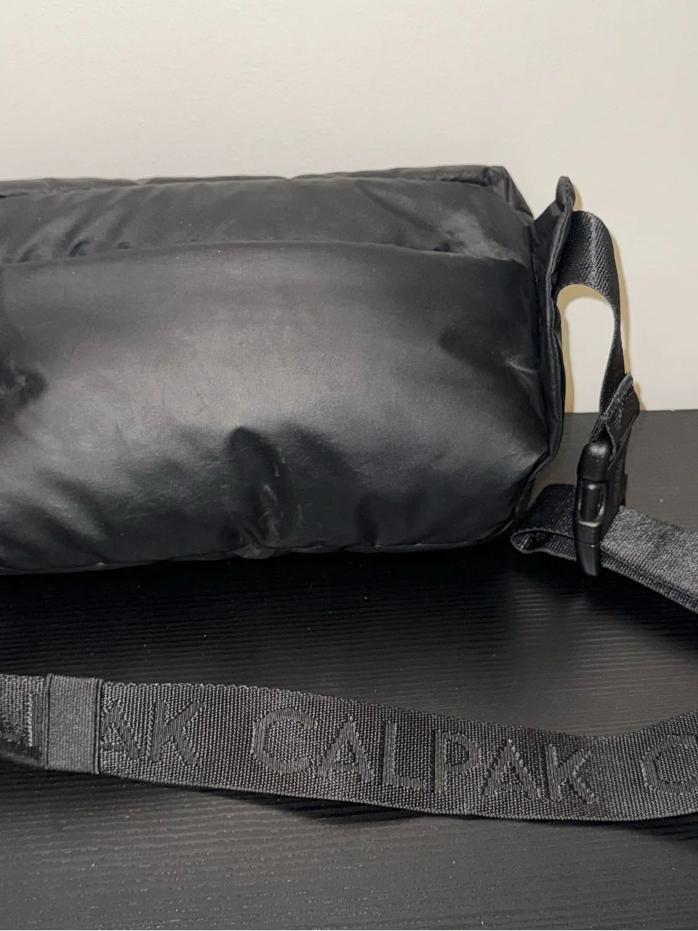 Calpak Luka quilted sling pack and belt bag